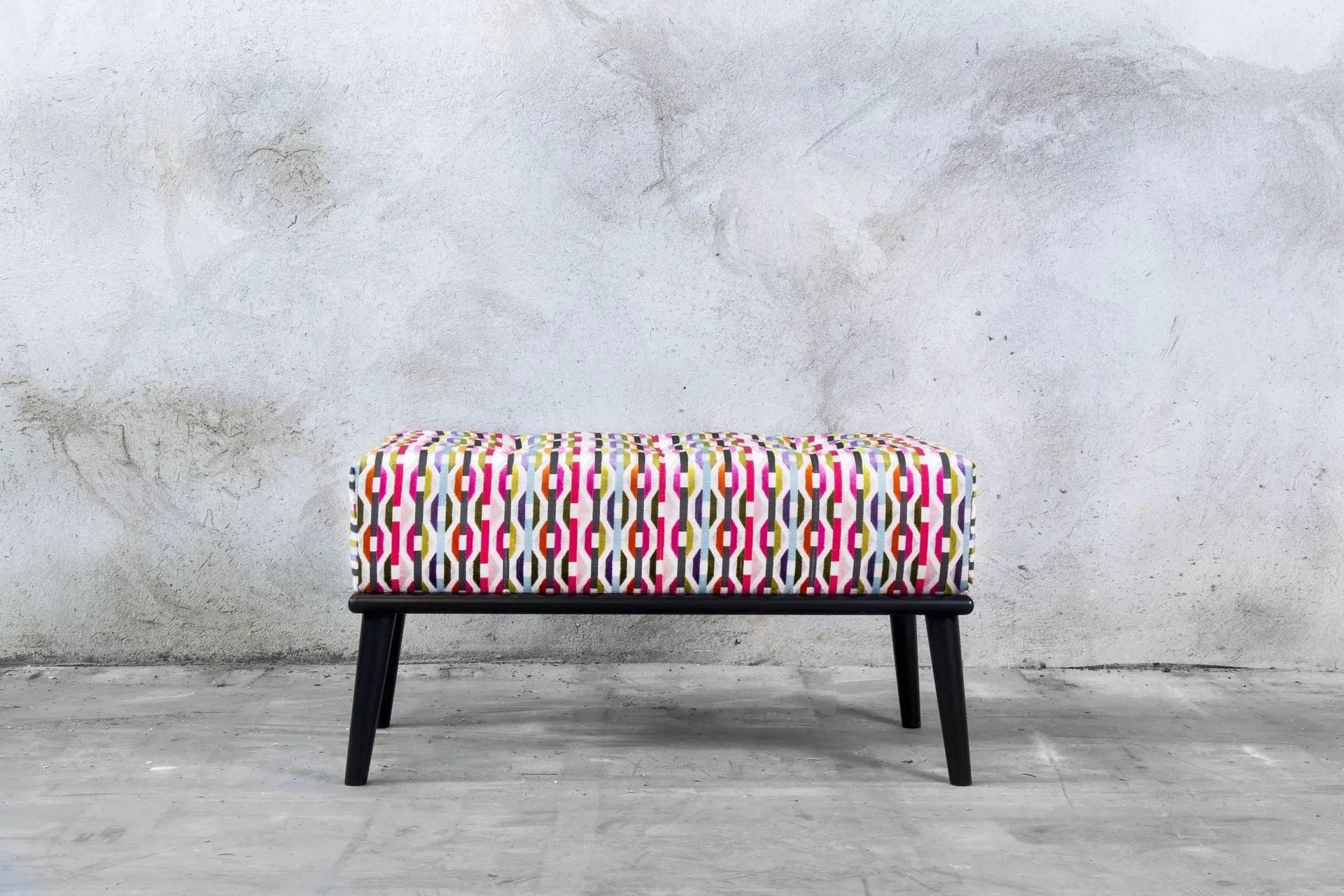 colorful bench with wooden legs